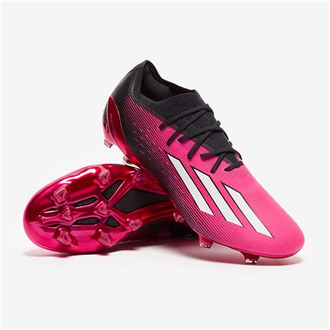 pink and black adidas boots